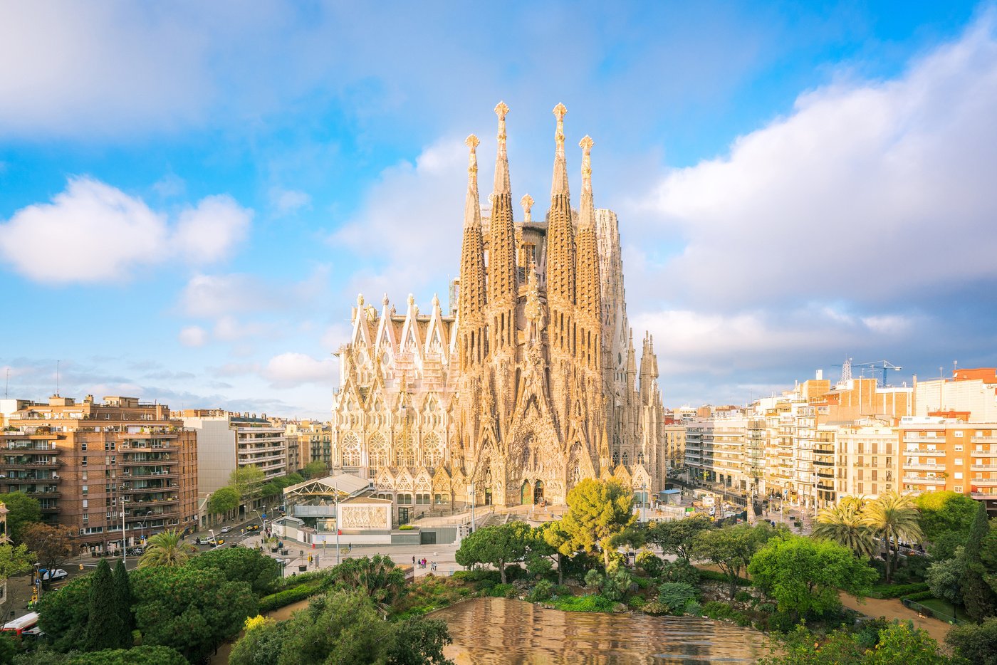 Landscape of Barcelona city from the roof top of hotal with travel point in church and park